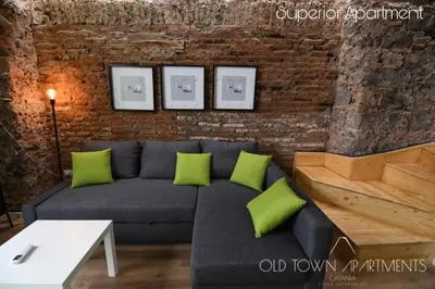 Area soggiorno di Old Town Apartments Catania
