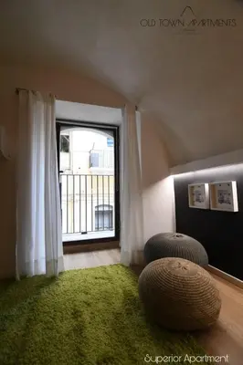 Area soggiorno di Old Town Apartments Catania