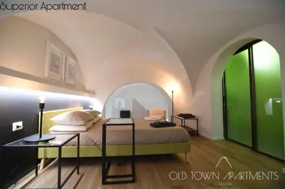 Letto o letti in una camera di Old Town Apartments Catania