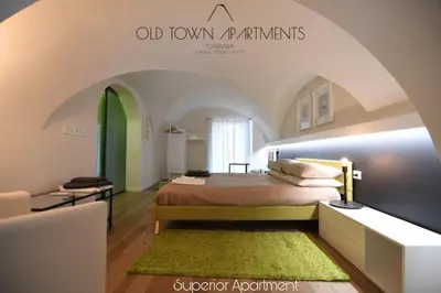 Letto o letti in una camera di Old Town Apartments Catania
