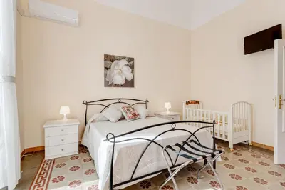 Letto o letti in una camera di GuestHost - Casa Marinella - Flat with Terrace
