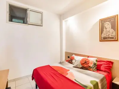 Letto o letti in una camera di Simplistic Apartment in Reitani near Lido Beach