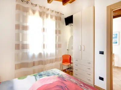 Letto o letti in una camera di Beachside Getaway w Garden