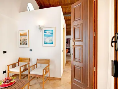 Area soggiorno di Beachside Getaway w Garden