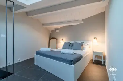Letto o letti in una camera di Ortigia Charming Suite