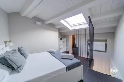 Letto o letti in una camera di Ortigia Charming Suite