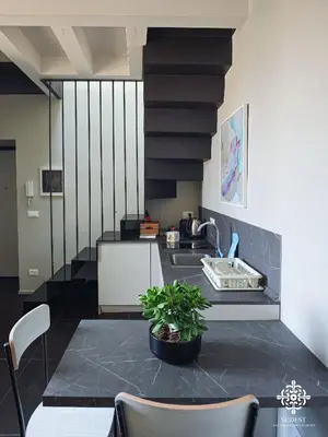 Area soggiorno di Ortigia Charming Suite