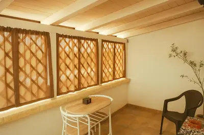 Area soggiorno di SPA ROOM SICILIA - Intera casa con spa privata Jacuzzi Sauna Bagno di Vapore
