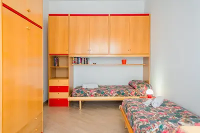 Letto o letti in una camera di GuestHost - Archaeological Park Apartment