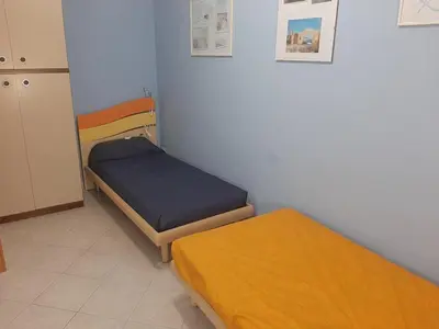 Letto o letti in una camera di Modern Den