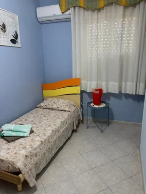 Letto o letti in una camera di Modern Den