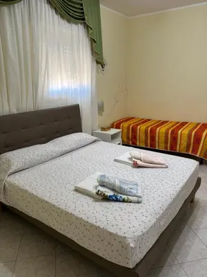 Letto o letti in una camera di Modern Den