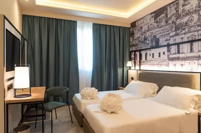 Letto o letti in una camera di Modica Boutique Hotel