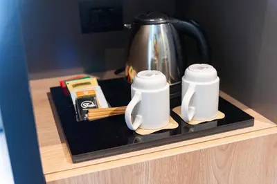 Set per la preparazione di tè e caffè presso Modica Boutique Hotel