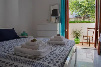 Letto o letti in una camera di Calypso Appartamento