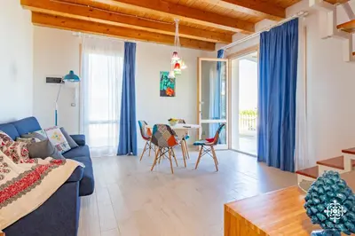 Area soggiorno di Beach Front Villas