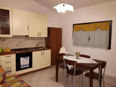 Cucina o angolo cottura di Charming apartment in Lido di Noto with fenced garden