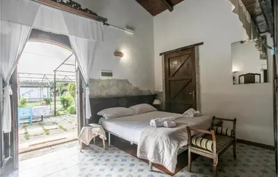 Letto o letti in una camera di 4 Bedroom Stunning Home In Arenella
