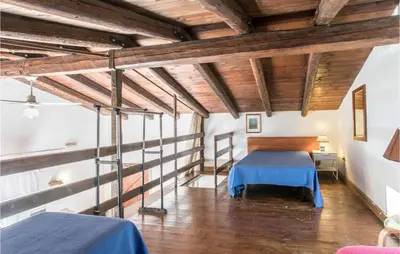 Letto o letti in una camera di 4 Bedroom Stunning Home In Arenella