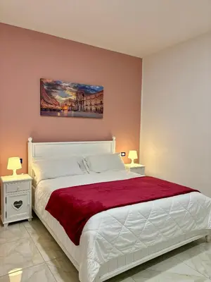 Letto o letti in una camera di Paolanna Rooms Affittacamere