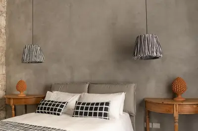 Letto o letti in una camera di Suite San Tommaso - Ortigia Holidays