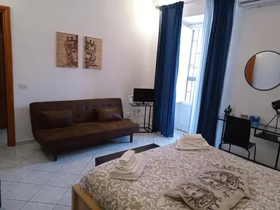Letto o letti in una camera di Casa Barocco Catania