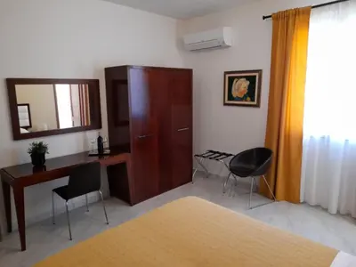 Letto o letti in una camera di Siracusa breakfast & rooms