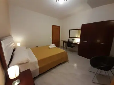Letto o letti in una camera di Siracusa breakfast & rooms