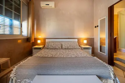 Letto o letti in una camera di Villa Dolmen Beach