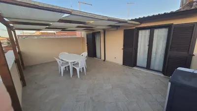 Balcone o terrazza di VacanzaPortopalo Appartamento Sole con Gazebo Terrazza e Wifi