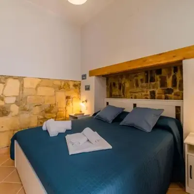 10 minuti a piedi da Ortigia - Cortile privato & AC