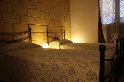 Letto o letti in una camera di Casa vacanze Vendicari