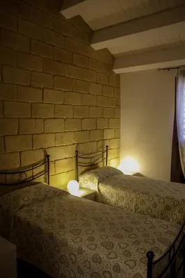 Letto o letti in una camera di Casa vacanze Vendicari