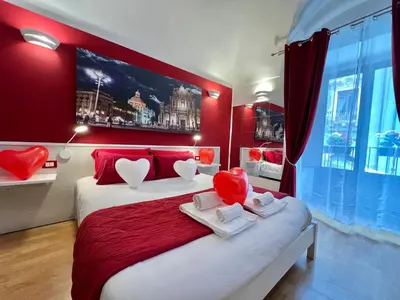 Letto o letti in una camera di CANTU' SUITE