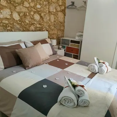Letto o letti in una camera di Ma-Ri House
