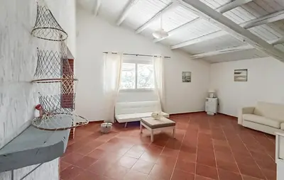 Area soggiorno di Nice Home In Rosolini With Wifi
