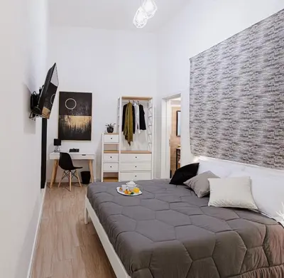 Letto o letti in una camera di Les Amis