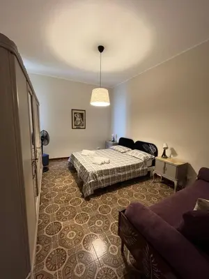 Letto o letti in una camera di Bombonera apartment