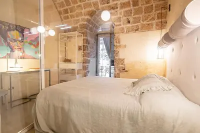 Letto o letti in una camera di Villa Il Carrubo val di noto con piscina privata