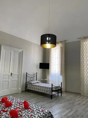Letto o letti in una camera di Monument home