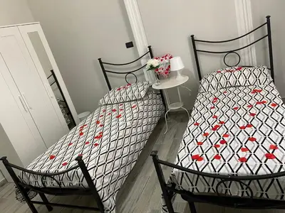 Letto o letti in una camera di Monument home