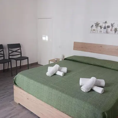 Letto o letti in una camera di Casa vacanze terrAmare