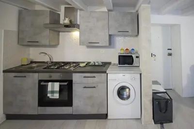 Cucina o angolo cottura di Maniace Homes - Federico & Angelica by Ortigia Apartments