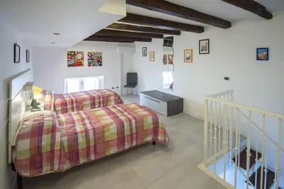 Letto o letti in una camera di Maniace Homes - Federico & Angelica by Ortigia Apartments