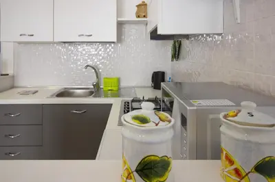 Cucina o angolo cottura di Maniace Homes - Federico & Angelica by Ortigia Apartments