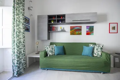 Area soggiorno di Maniace Homes - Federico & Angelica by Ortigia Apartments