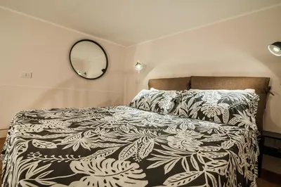 Letto o letti in una camera di San Berillo home