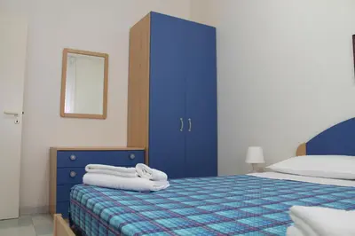 Letto o letti in una camera di Le Dune Residence