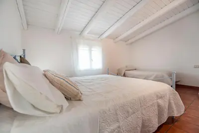 Letto o letti in una camera di Villa Sasè - SiciliaVacanza