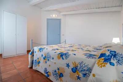Letto o letti in una camera di Villa Sasè - SiciliaVacanza